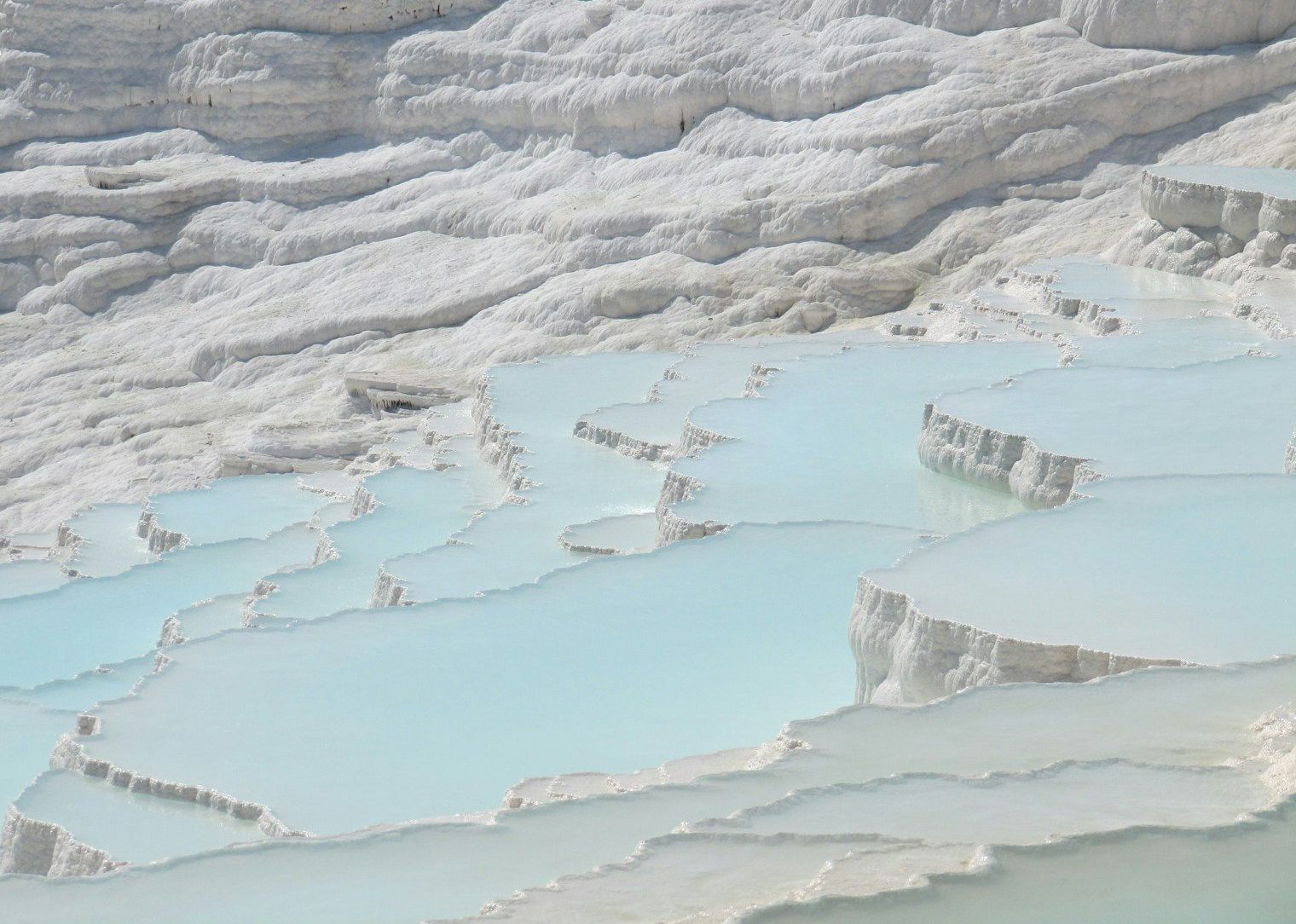 a large body of water surrounded by mountains